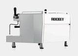 Coffee machine with 'Rocket' branding on a white background